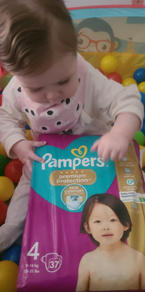 Having fun with my pampers premium protection. Approved by Sophia 💕