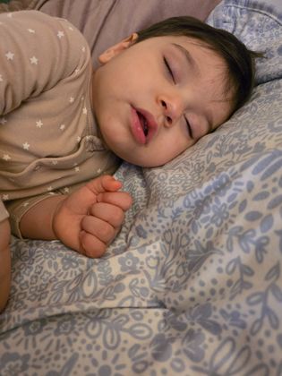 Night sleep wearing pampers nappies