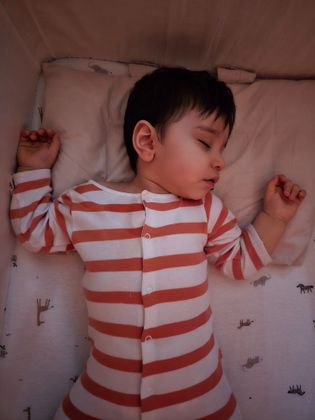 Night time sleeping. Baby Toni Wearing Pampers 6+