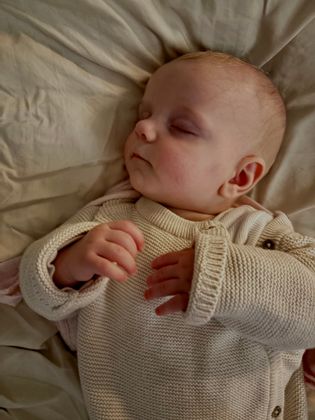 Sleeping peacefully wearing his Size 2 pampers. 6:54pm